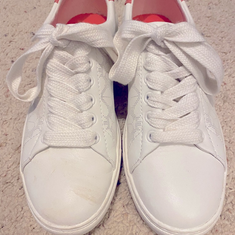 Kate Spade white tennis shoe. Like new. Only wore twice. Size 6.